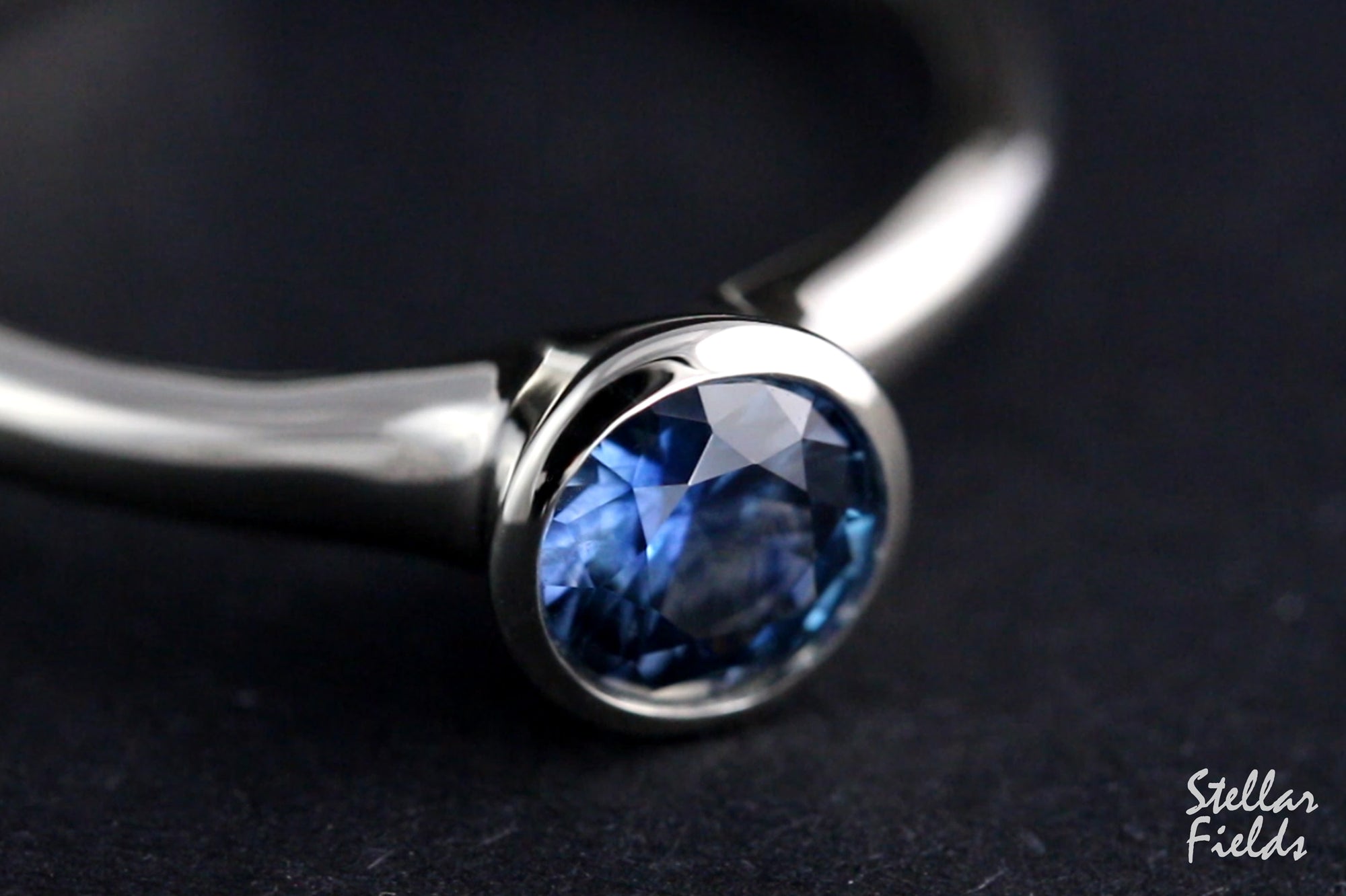 cornflower blue montana sapphire bezel engagement ring platinum