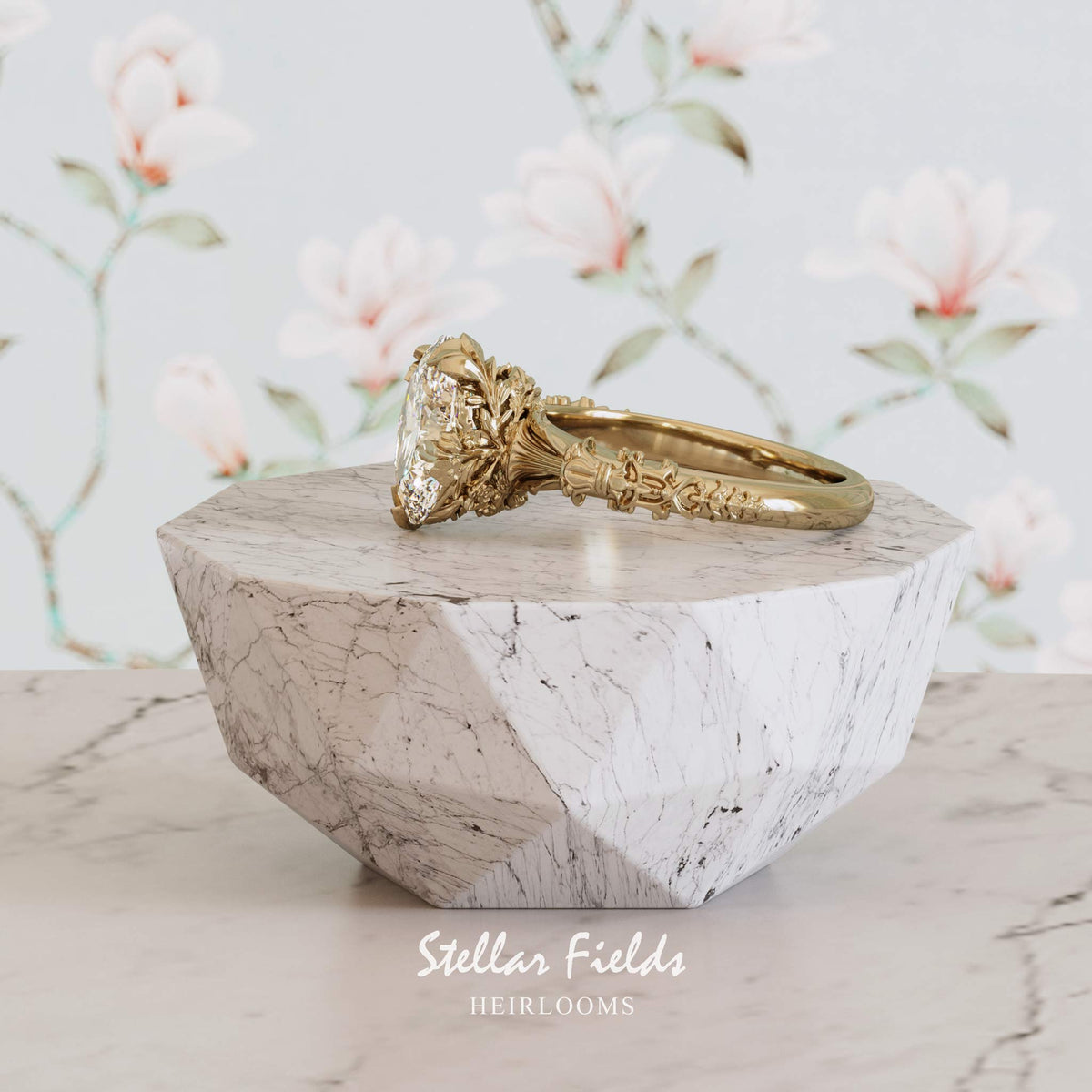 A yellow gold ring with a large oval cut diamond and ornate, sculpted floral and ornamentation details on the band and stone setting.