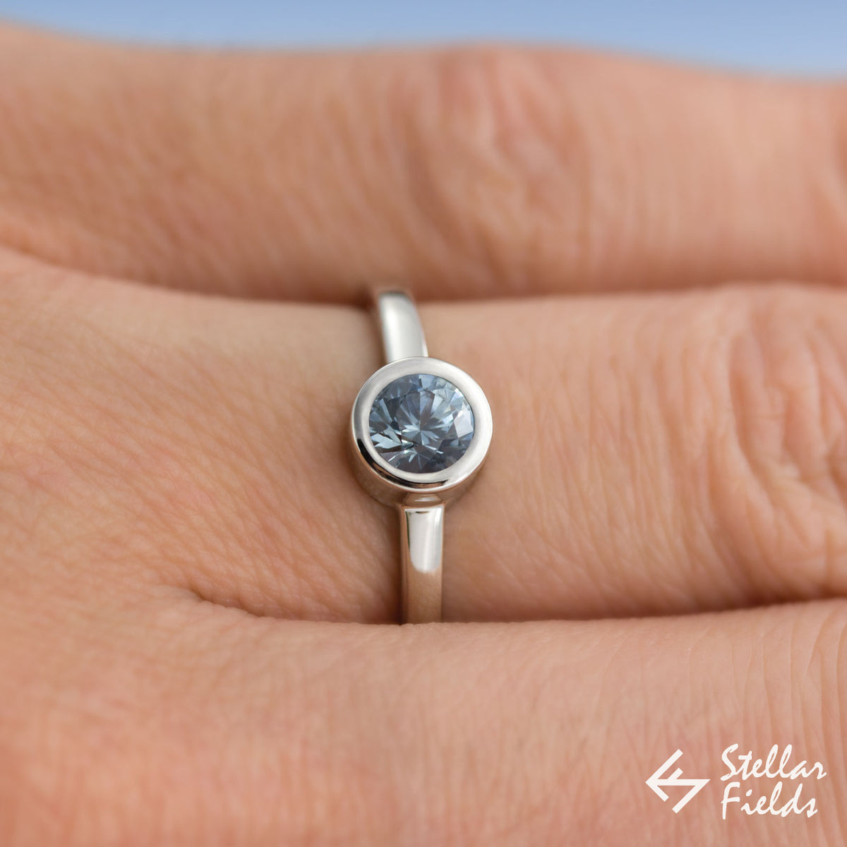 5mm Round Blue Sapphire Bezel Set Engagement Ring in 14k White Gold Platinum Stellar Fields Jewelry