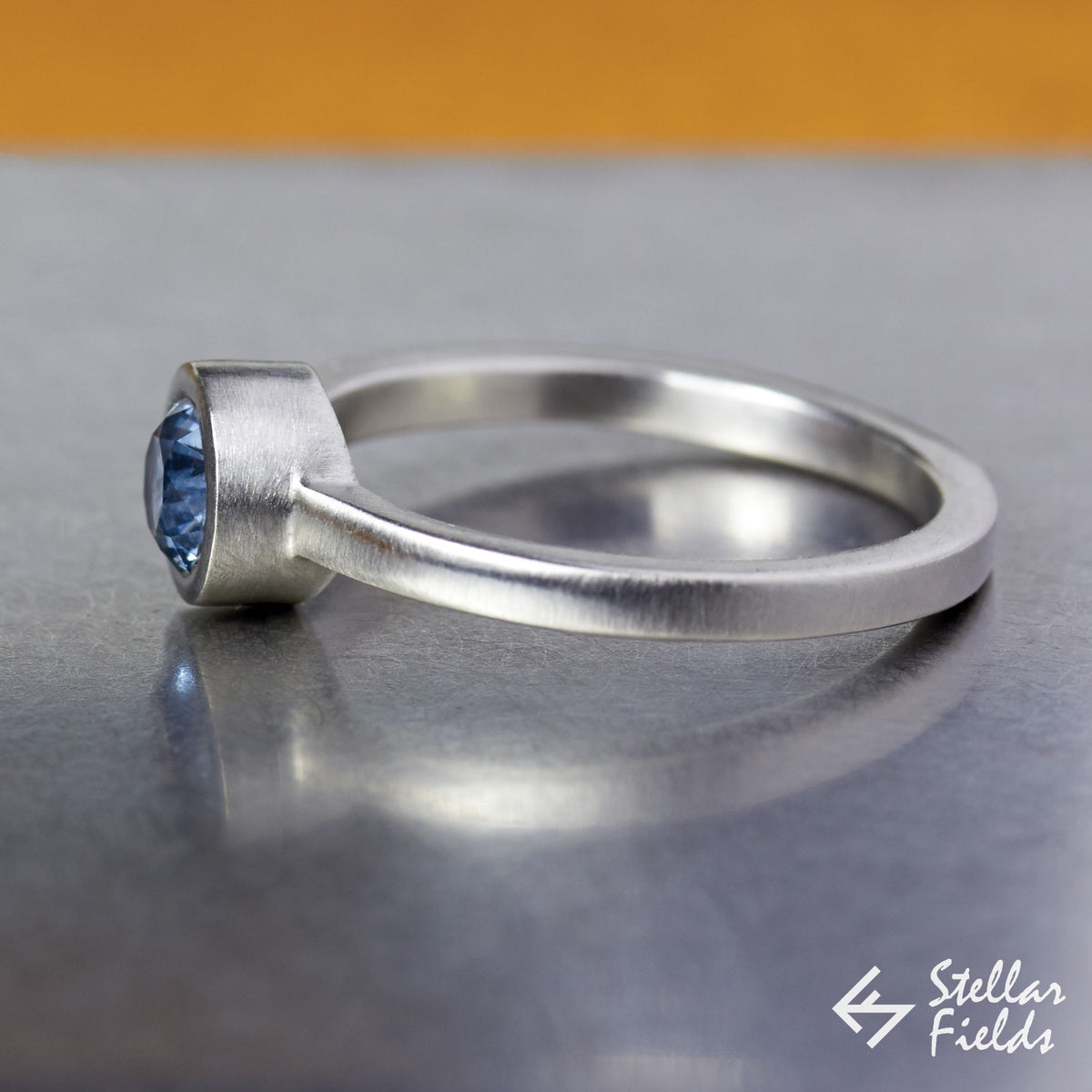 Blue Montana Sapphire Minimal Bezel Engagement Ring Platinum Stellar Fields