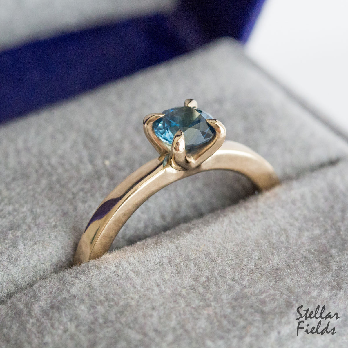 Teal Blue Montana Sapphire prong engagement ring solitaire ring 14k gold Stellar Fields Jewelry