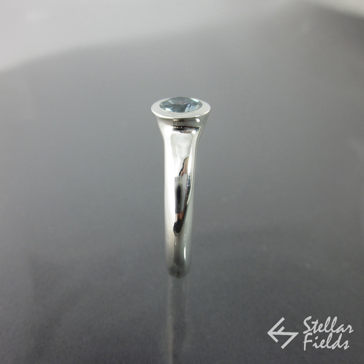 5mm Round Montana Sapphire Modern Bezel Engagement Ring Platinum