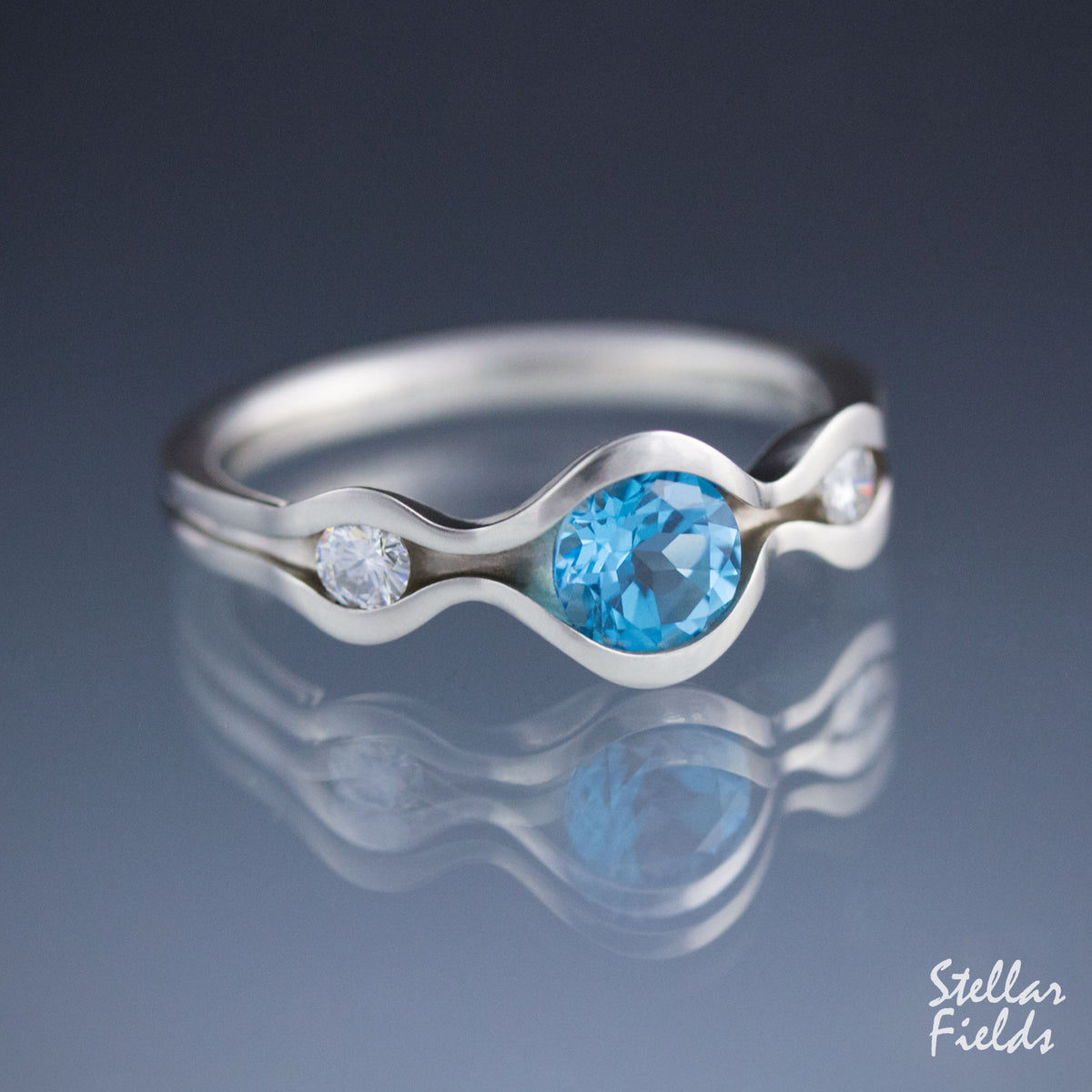 Swiss Blue Topaz Wave Ring Three Stone Ring Canadian Diamonds Platinum Stellar Fields Jewelry