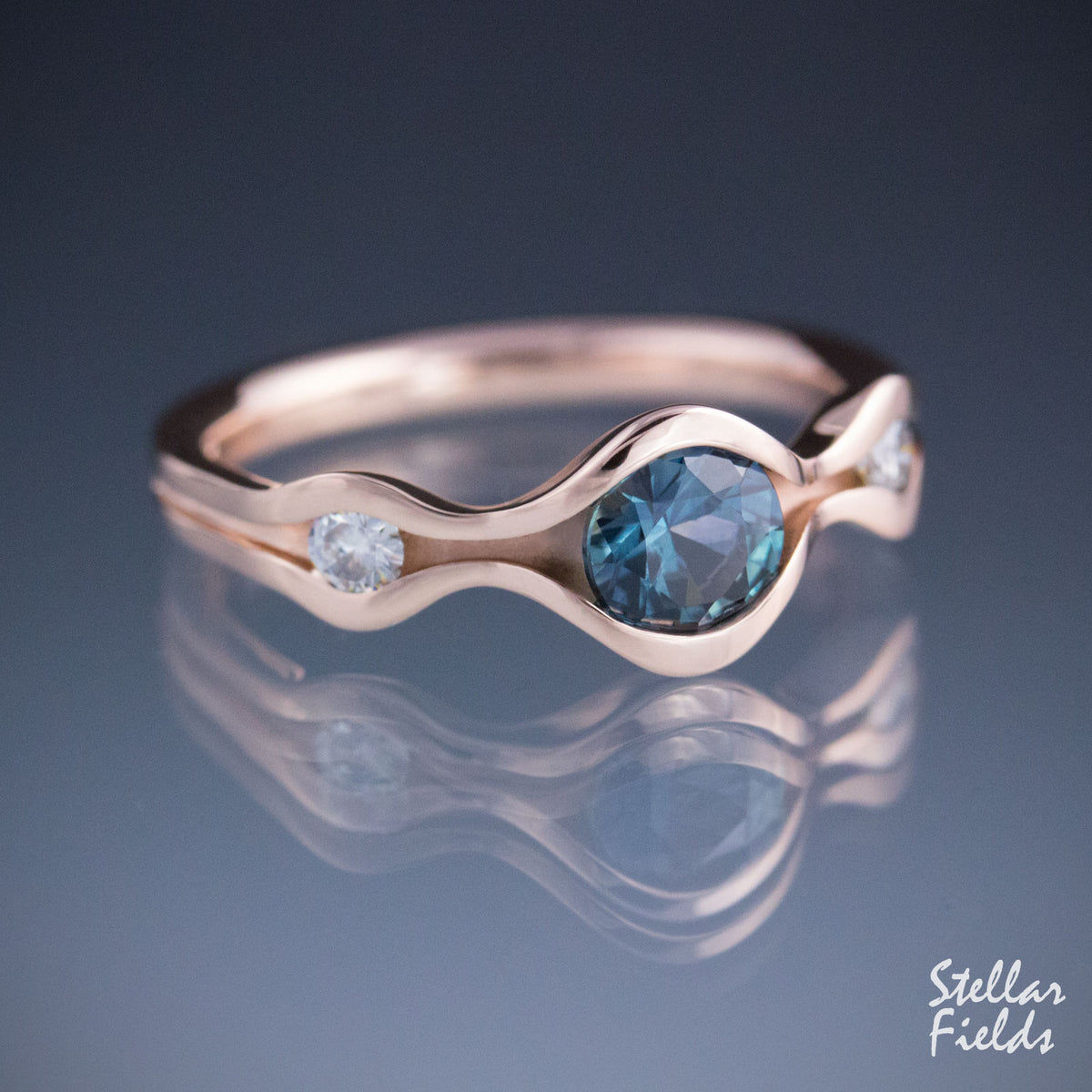 Teal Sapphire Wave Ring Three Stone Engagement Ring Rose Gold Stellar Fields 