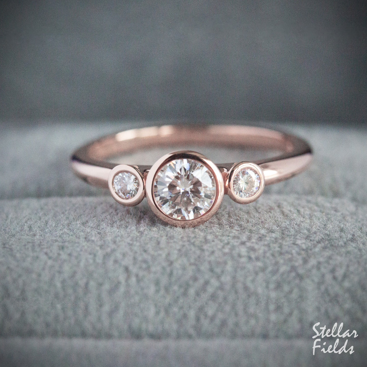 Three Stone Minimal Engagement Ring Modern Moissanite Diamonds 14k Rose Gold Stellar Fields Jewelry