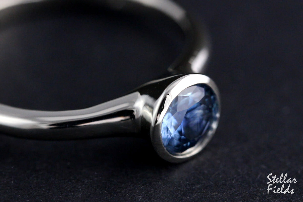 cornflower blue sapphire bezel engagement ring platinum