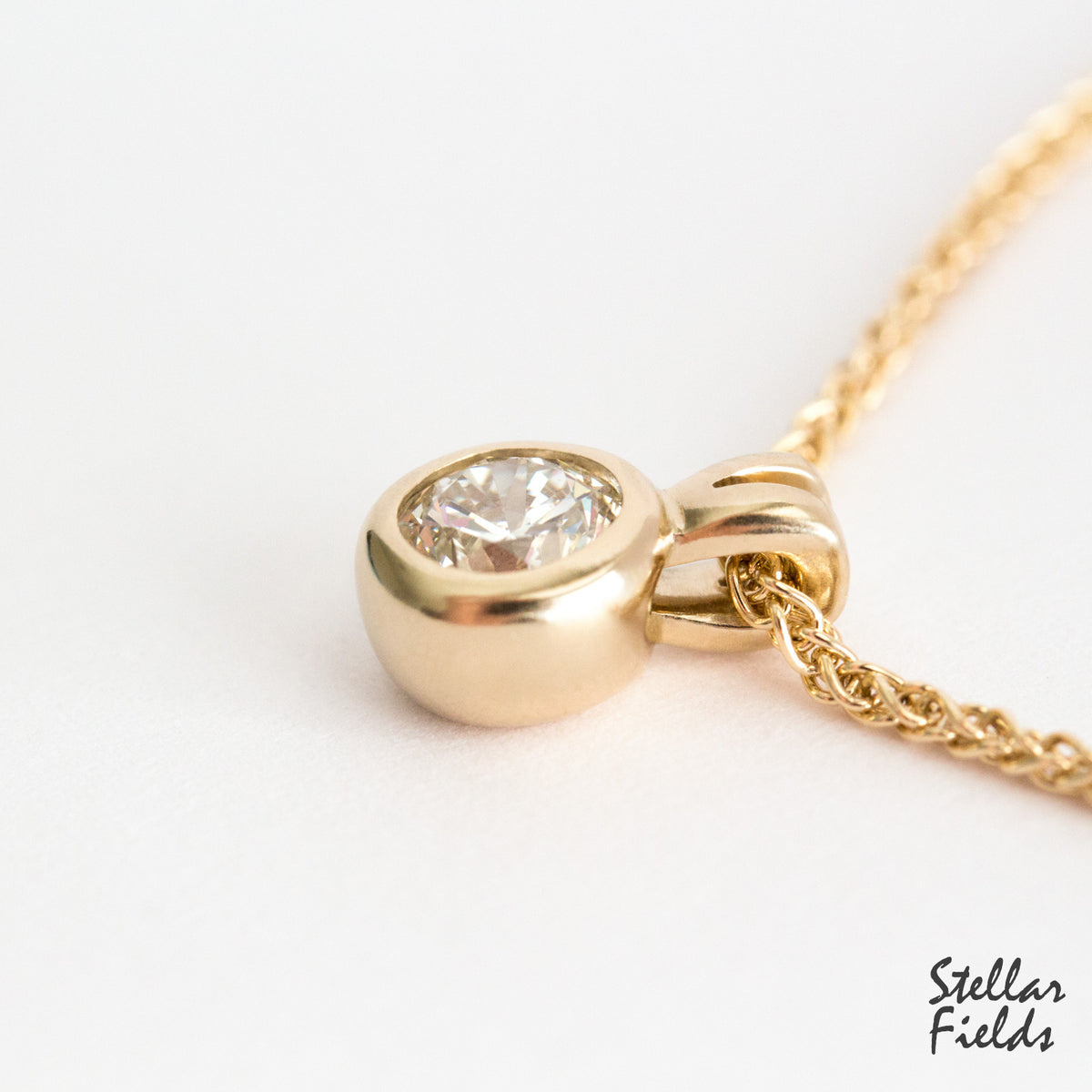 moissanite solitaire locket 14k gold Stellar Fields Jewelry