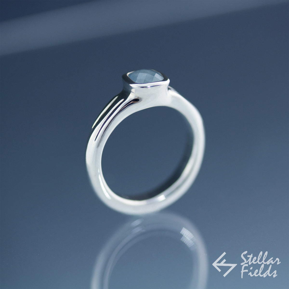 Cushion Cut Blue Montana Sapphire Bezel Engagement Ring - Stellar Fields